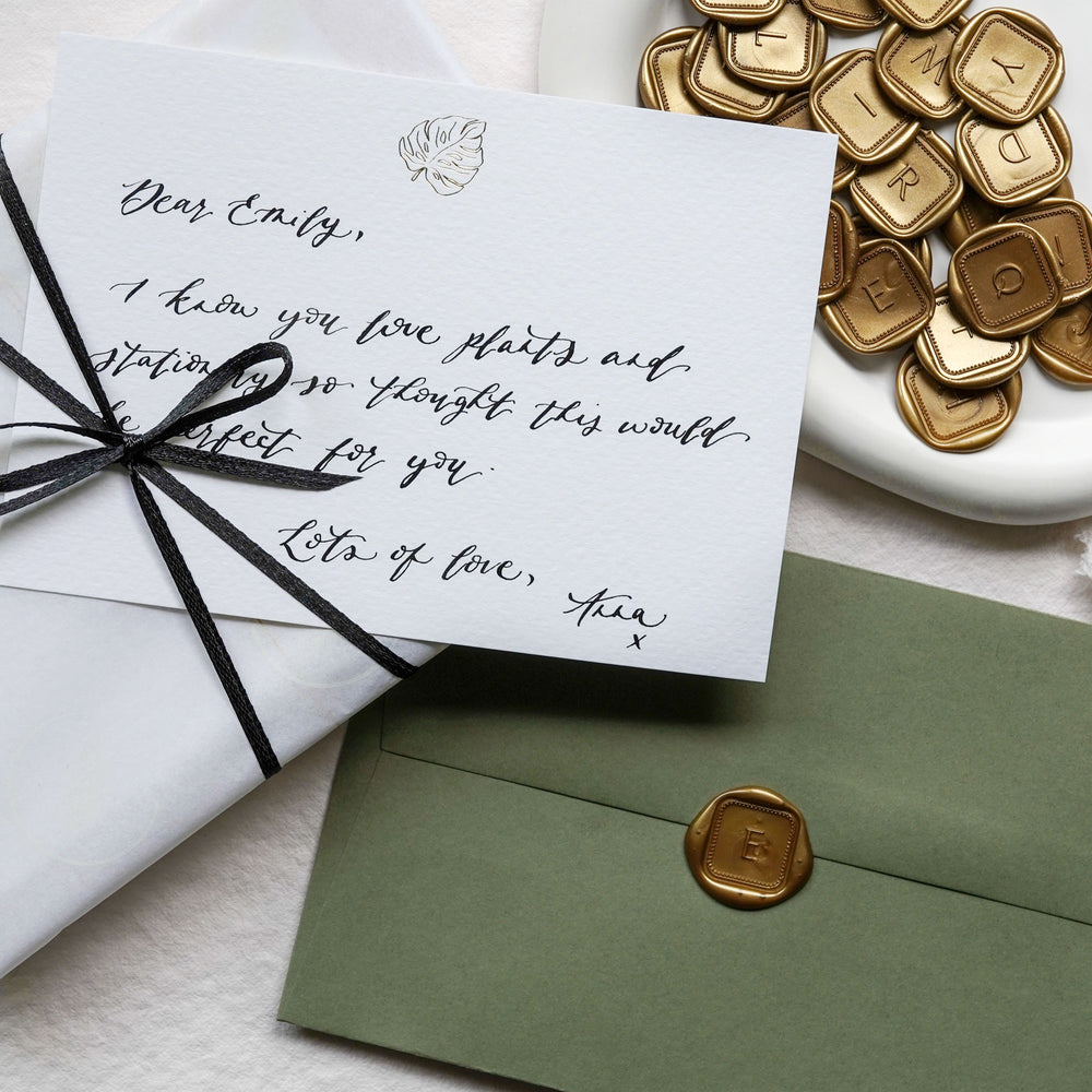 
                      
                        A perfect blend of luxury and tradition, this gold foiled letter writing set with a monstera leaf design is the ideal gift for those who appreciate the art of thoughtful communication.
                      
                    