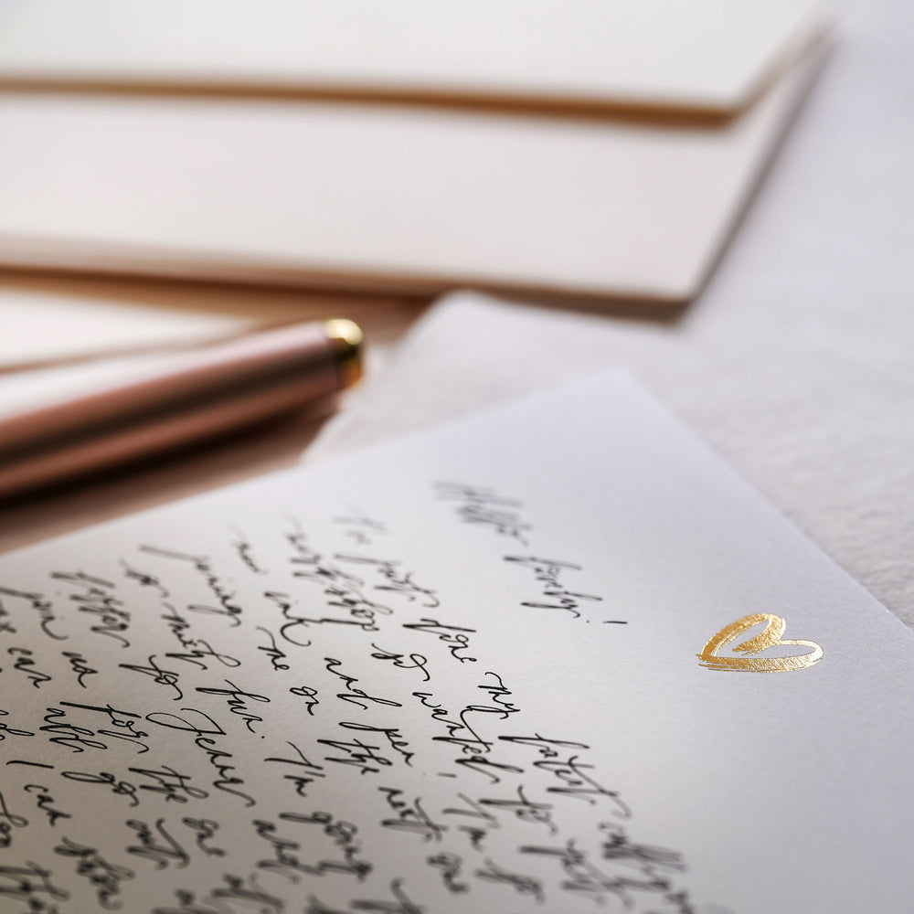 Rediscover the joy of handwritten correspondence with our luxury letter writing set with a contemporary heart design.