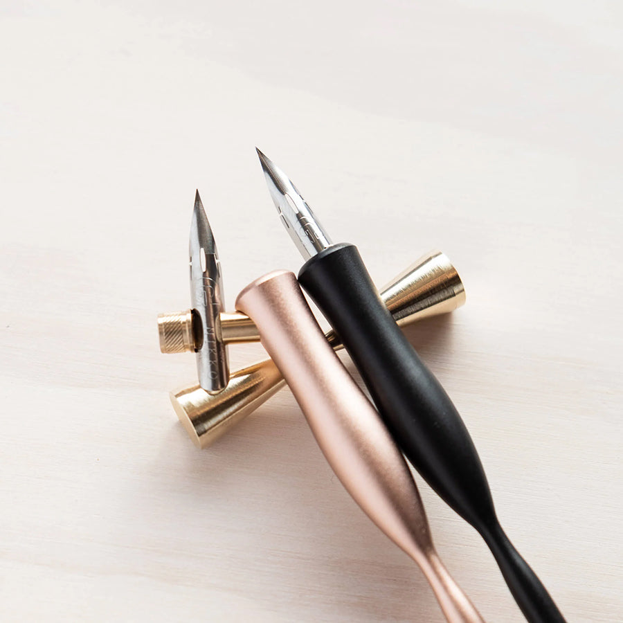 
                  
                    Machined from solid brass and unlike most rests, it will happily accommodate up to three brushes or pens. Goodbye messy ink splattered desk!
                  
                