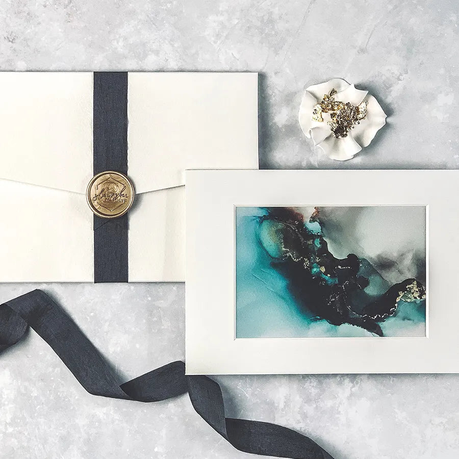 Load image into Gallery viewer, Luxury alcohol ink A6 print taken from our original painting featuring a delicate blue &amp;amp; black design. Blue &amp;amp; Black Alcohol Ink A6 Mounted Art Print - a contemporary gift.
