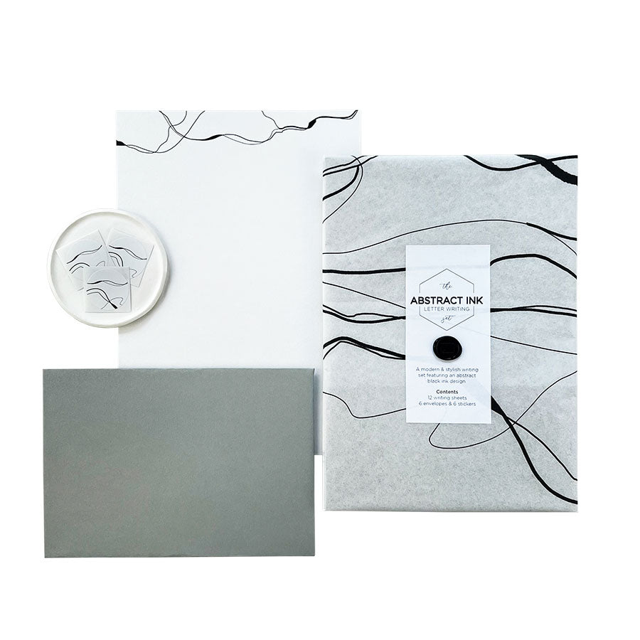 A luxury abstract ink letter writing set presented in our bespoke tissue paper & finished with a mini wax seal.