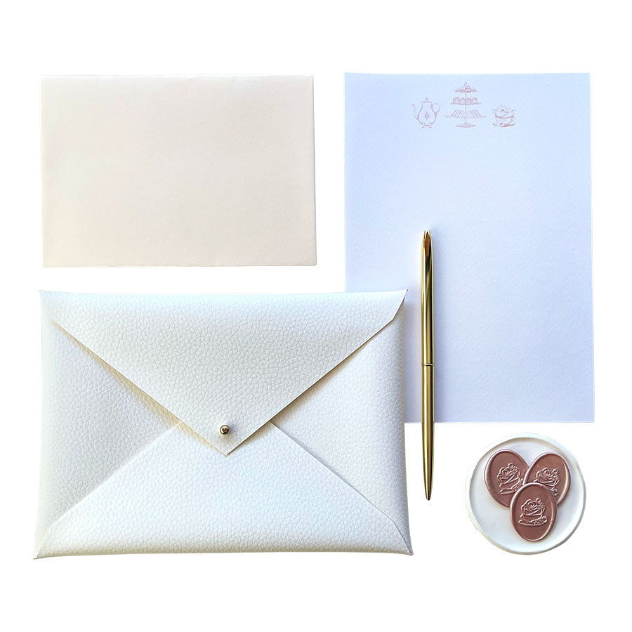 Afternoon tea writing set, handmade blush faux-leather envelope pouch and hand illustrated writing paper. The Afternoon Tea Collection Writing Set.