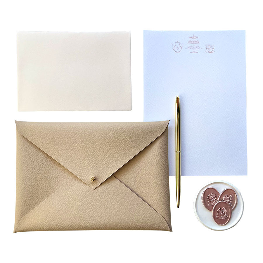 
                      
                        Afternoon tea writing set, handmade blush faux-leather envelope pouch and hand illustrated writing paper. The Afternoon Tea Collection Writing Set.
                      
                    