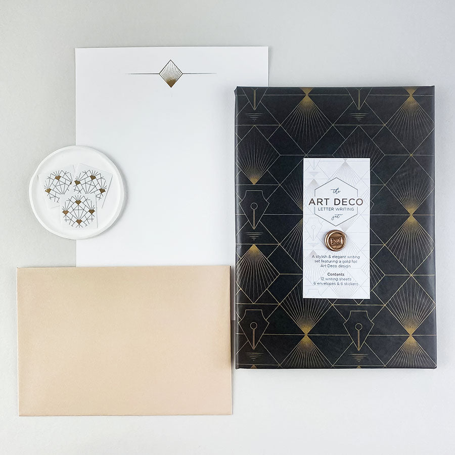 
                      
                        A luxury Art Deco themed hand illustrated letter writing set presented in our bespoke tissue paper & finished with a mini wax seal.
                      
                    