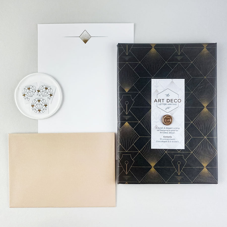 A luxury Art Deco themed hand illustrated letter writing set presented in our bespoke tissue paper & finished with a mini wax seal.