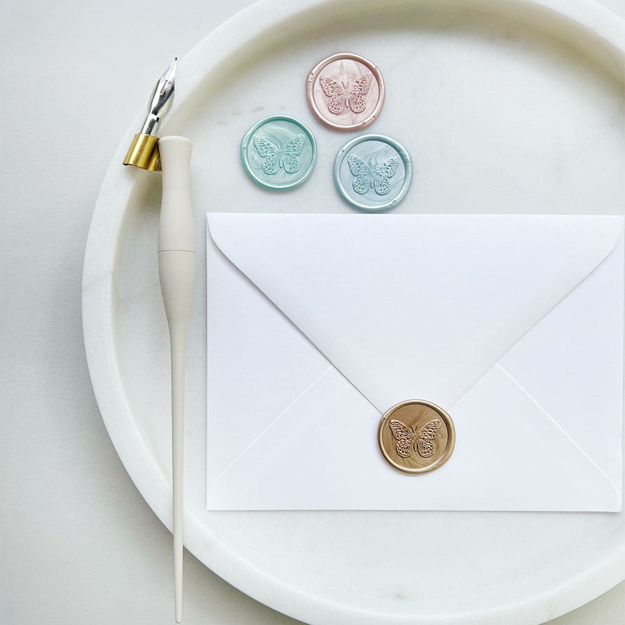 Beautiful butterfly design wax seals. Individually handmade with high quality wax, they are available to order in a variety of colours.