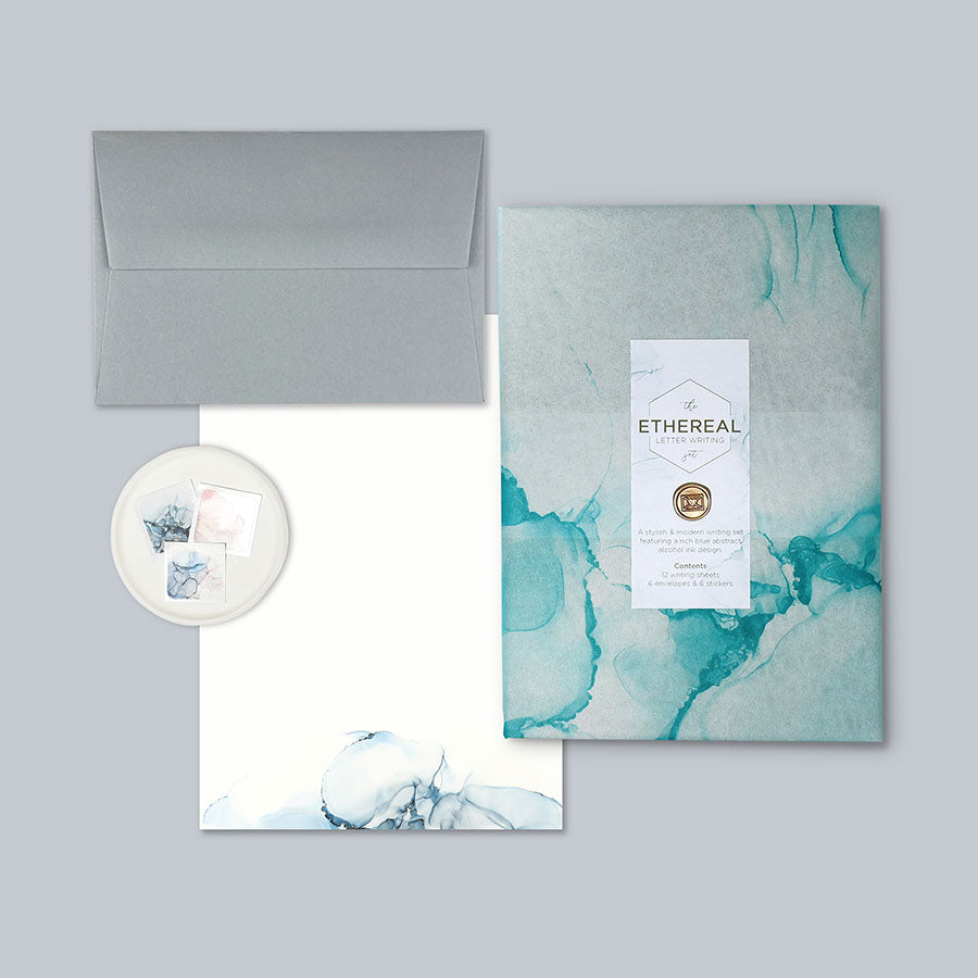 A stylish alcohol ink inspired luxury letter writing set presented in our bespoke tissue paper & finished with a mini wax seal.