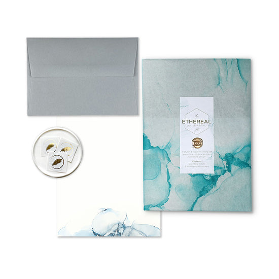 A stylish alcohol ink inspired luxury letter writing set presented in our bespoke tissue paper & finished with a mini wax seal.