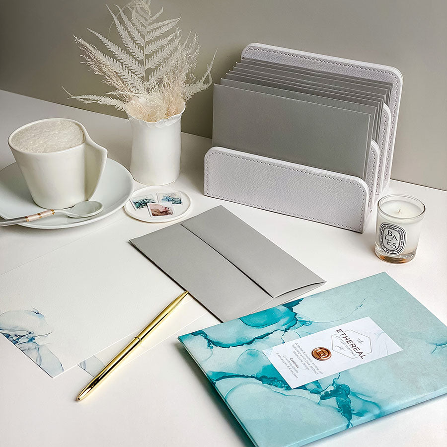 A stylish alcohol ink inspired luxury letter writing set presented in our bespoke tissue paper & finished with a mini wax seal.