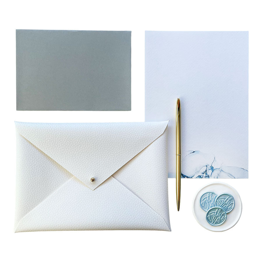 
                  
                    Luxury alcohol ink design writing set, handmade white faux-leather envelope pouch, writing paper and envelopes. The Ethereal Collection Writing Set - a premium themed gift.
                  
                