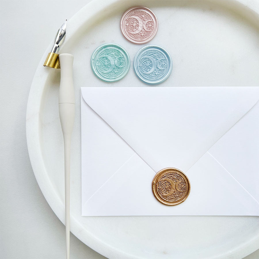 Load image into Gallery viewer, elegant moon &amp;amp; star design wax seals. Individually handmade with high quality wax, they are available to order in a variety of colours.
