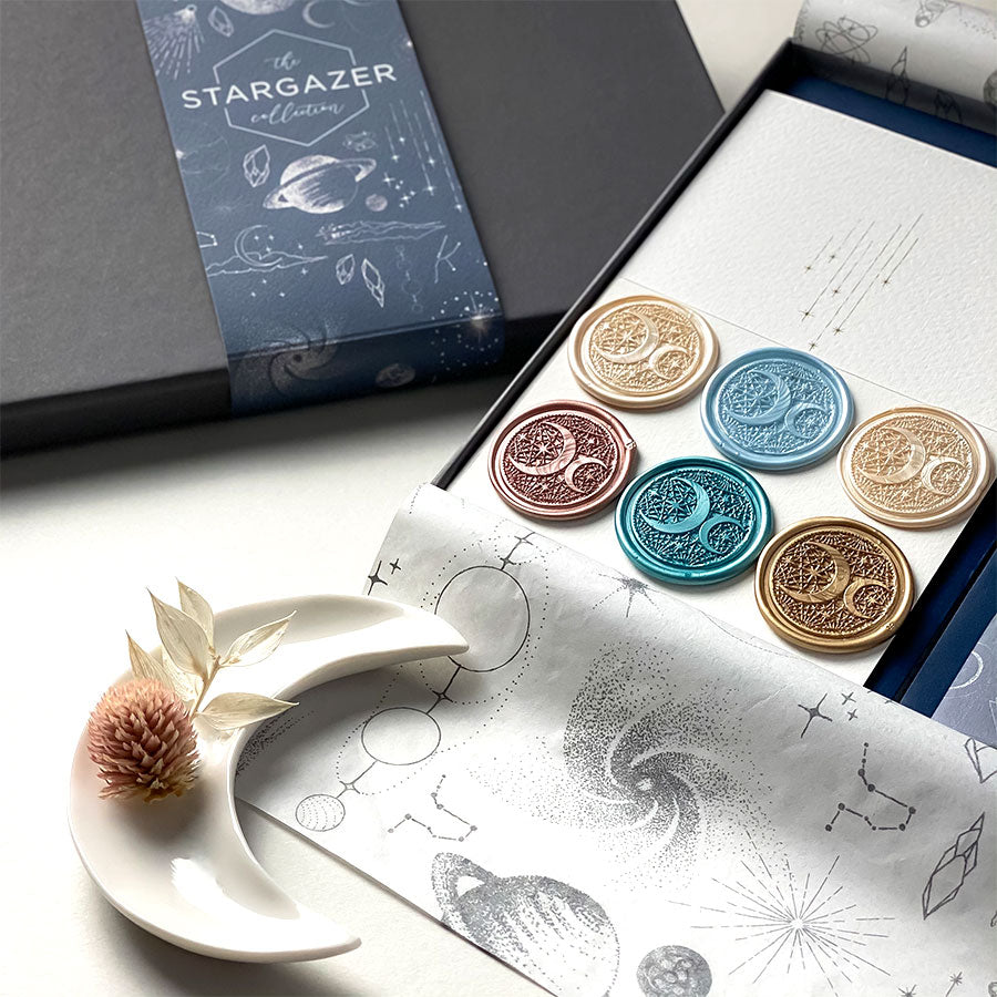 Luxury space stationery, hand illustrated - notebook, postcards, gIft wrap and wax seals. The Stargazer Collection Stationery Set - a premium themed gift.
