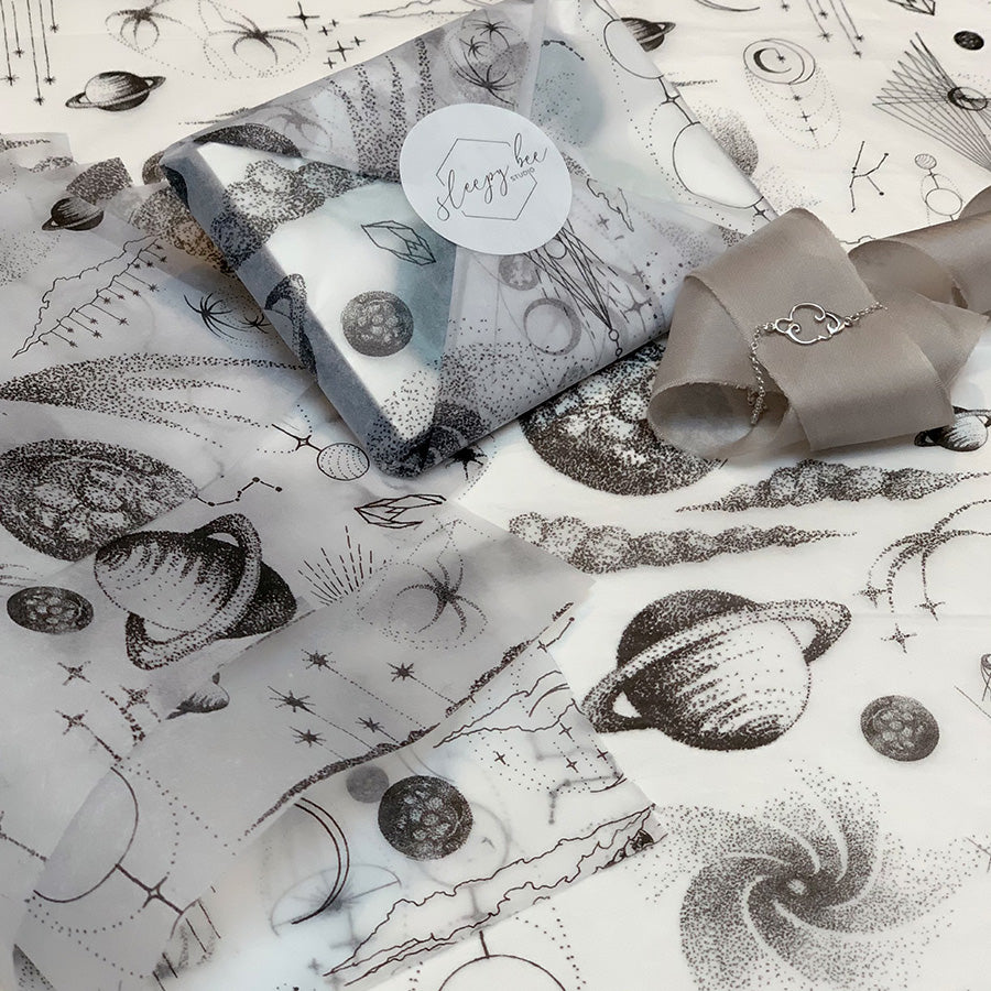 Load image into Gallery viewer, Elegant galaxy tissue paper with planets and stars, handmade, Stargazer Hand Illustrated Tissue Paper (3 sheets) - a premium themed gift.
