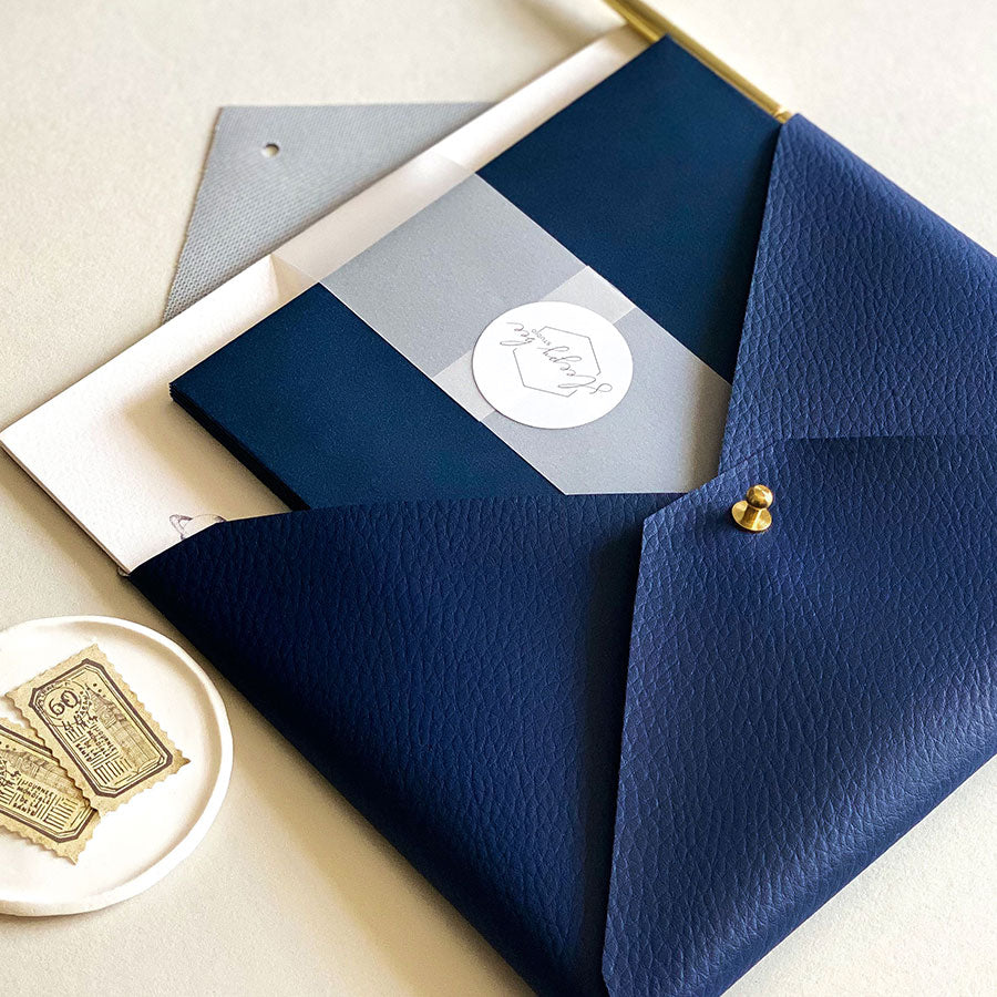 Load image into Gallery viewer, Luxury space writing set, handmade navy faux-leather envelope pouch and hand illustrated writing paper and envelopes. The Stargazer Collection Writing Set - a premium themed gift.
