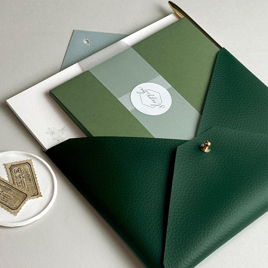 Luxury plant writing set, handmade dark green faux-leather envelope pouch and hand illustrated – writing paper and envelopes. The Botanical Collection Writing Set – a premium themed gift.