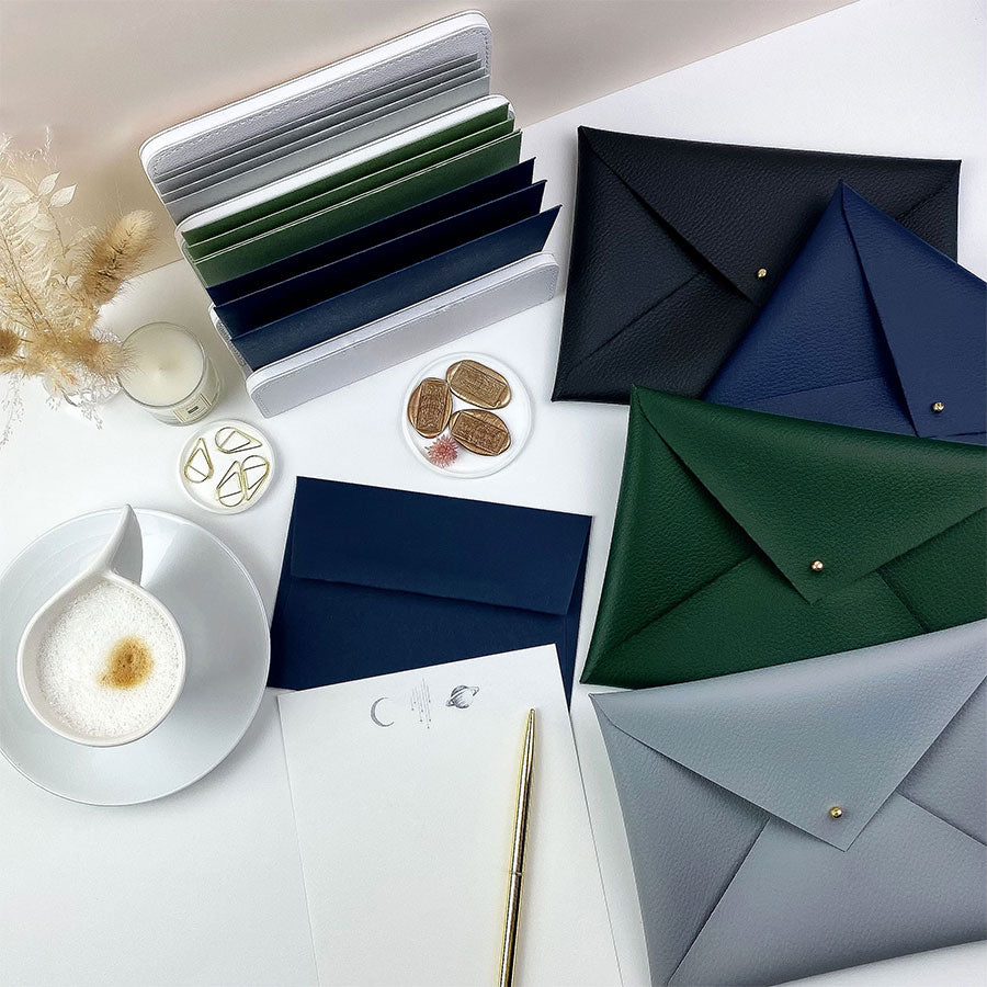 Luxury themed writing sets, handmade navy faux-leather envelope pouch and hand illustrated - writing paper and envelopes. Themed Writing Sets - a premium themed gift.