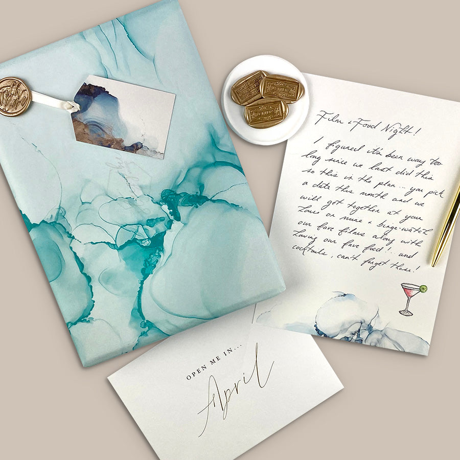Year of letters box, a unique keepsake gift with luxury writing paper, envelopes, & gold foil stickers for you to write 12 letters.